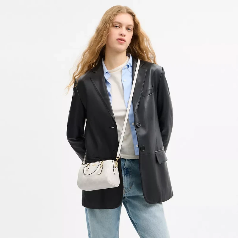 Mini Rowan Crossbody Bag In Signature Canvas