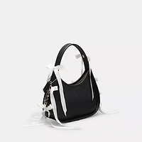 Ergo Bag In Coachtopia Leather With Allover Bows