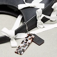 Ergo Bag In Coachtopia Leather With Allover Bows