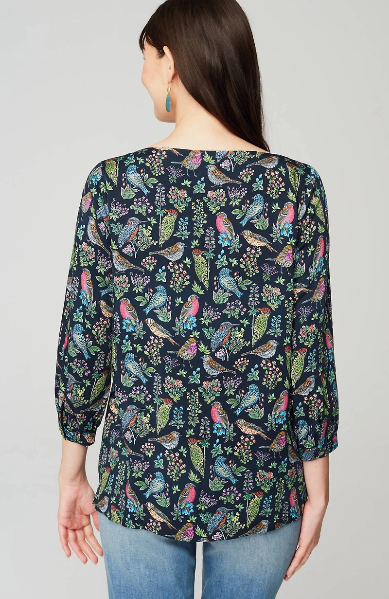bird-printed boat-neck top