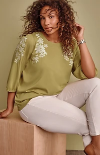 floral-embroidered top