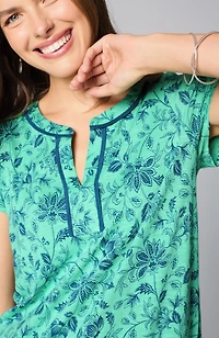 piped tunic