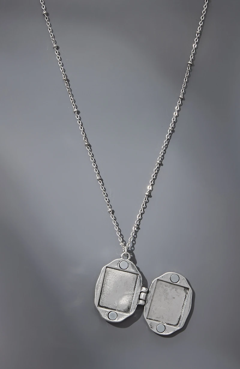 compassion fund mother-of-pearl locket