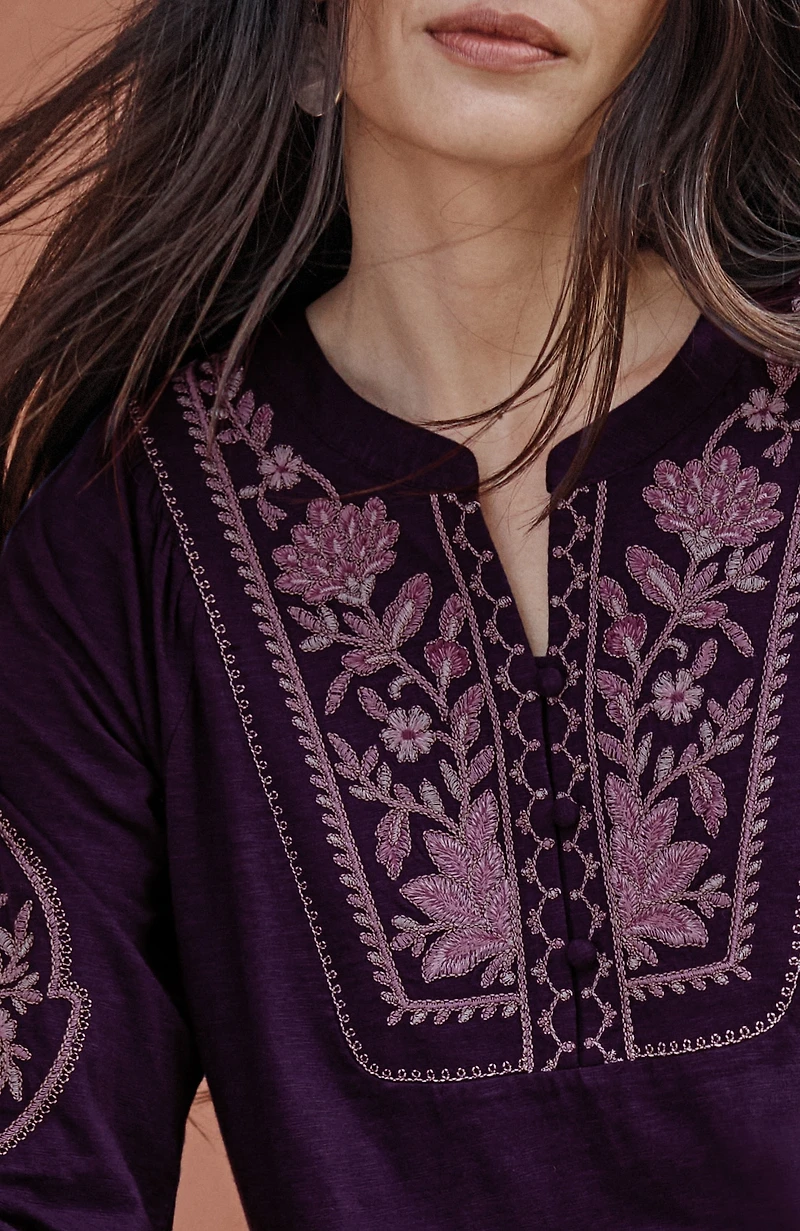 feminine floral-embroidered top