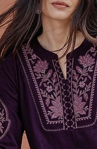 feminine floral-embroidered top
