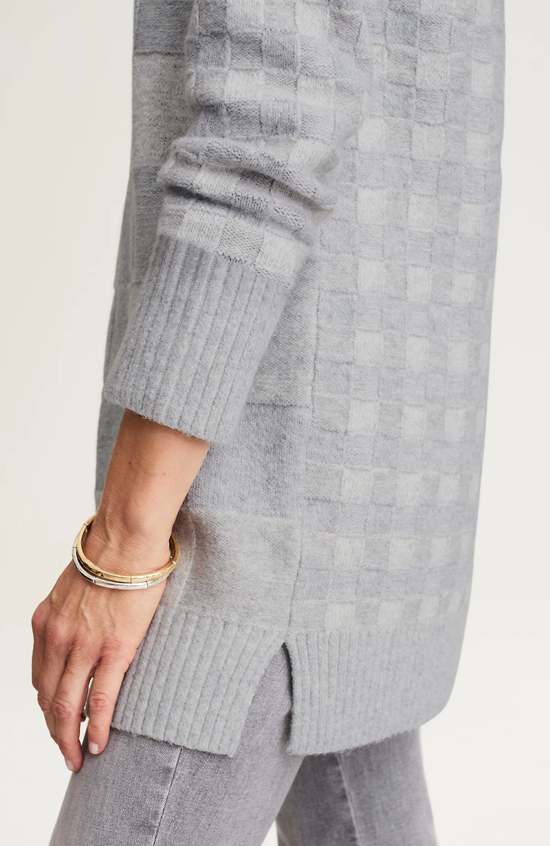 checkered turtleneck sweater