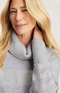 checkered turtleneck sweater