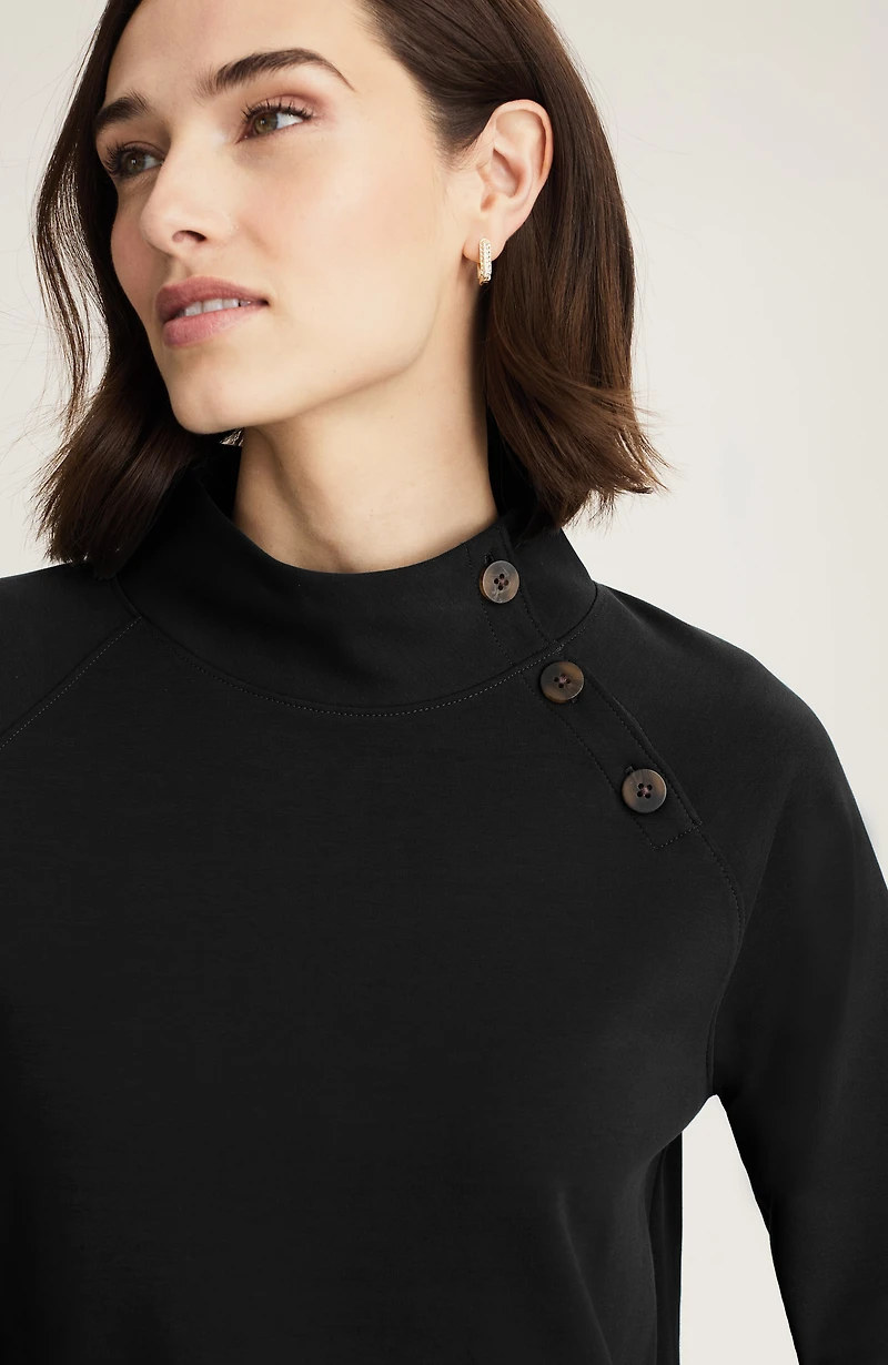 buttoned-shoulder knit top