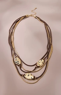 metal and corded statement necklace