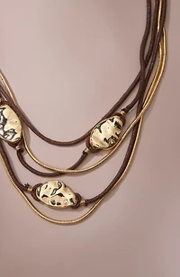 metal and corded statement necklace