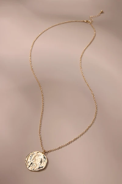 hammered coin pendant