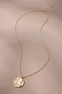 hammered coin pendant