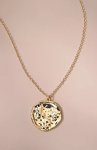 hammered coin pendant