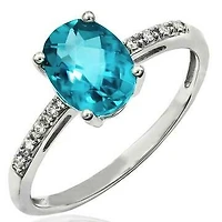 Oval Blue Topaz Ring with Diamond Accent 14KT Gold