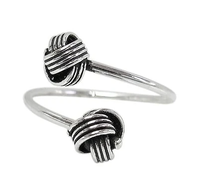 Sterling Silver, Adjustable Love Knot Ring. Approximate Knot Size: 7mm Diameter