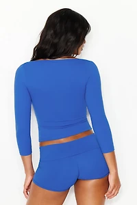 Haut Sleek à encolure ouverte et manches 3/4