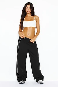 Pantalon sport en nylon à bandes latérales