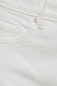 Jean Mika à taille mi-haute et jambe droite décontractée