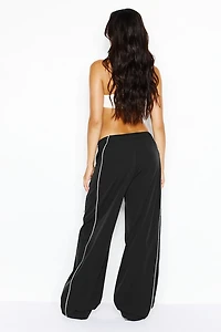 Pantalon sport en nylon à bandes latérales