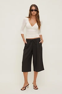 Pantalon capri en lin Leo