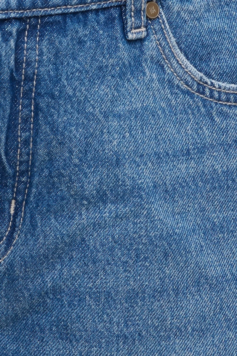 Jean Mika à taille mi-haute et jambe droite décontractée