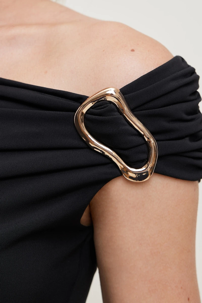 Haut sculptant orné d'une boucle