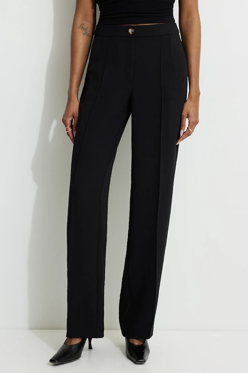 Pantalon surpiqué à jambe droite