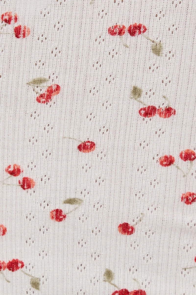 Camisole en pointelle à bordure ondulée