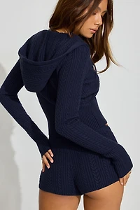 Haut ajusté en mailles torsadées à fermeture éclair