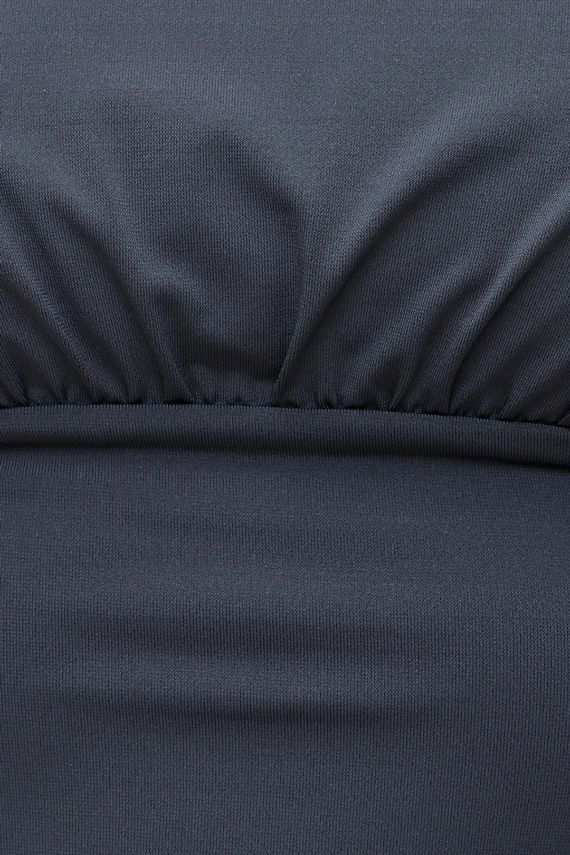 Haut sculptant à taille cintrée