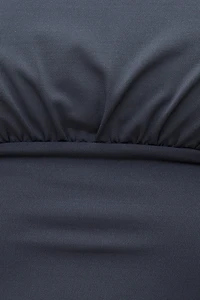 Haut sculptant à taille cintrée