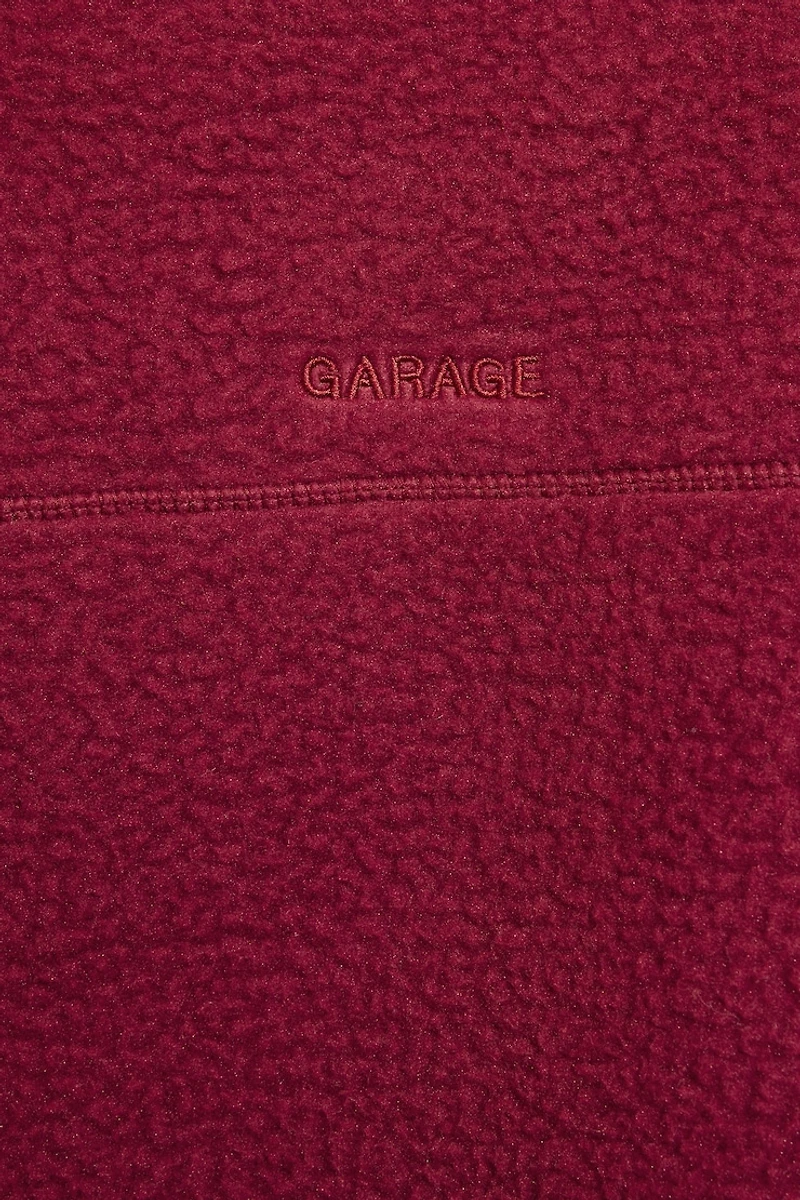 Haut à col montant en sherpa demi-fermeture éclair