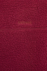 Haut à col montant en sherpa demi-fermeture éclair