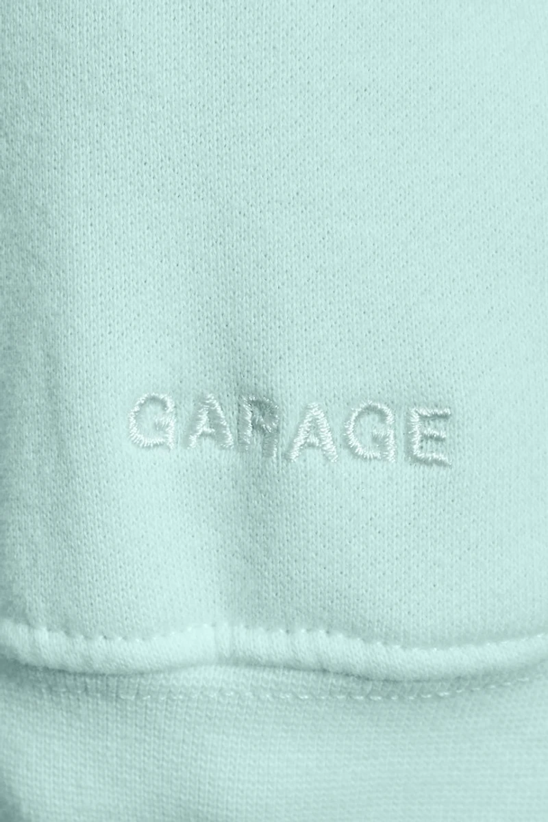 Haut à capuchon zippé en coton UltraFleece