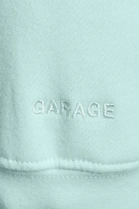 Haut à capuchon zippé en coton UltraFleece