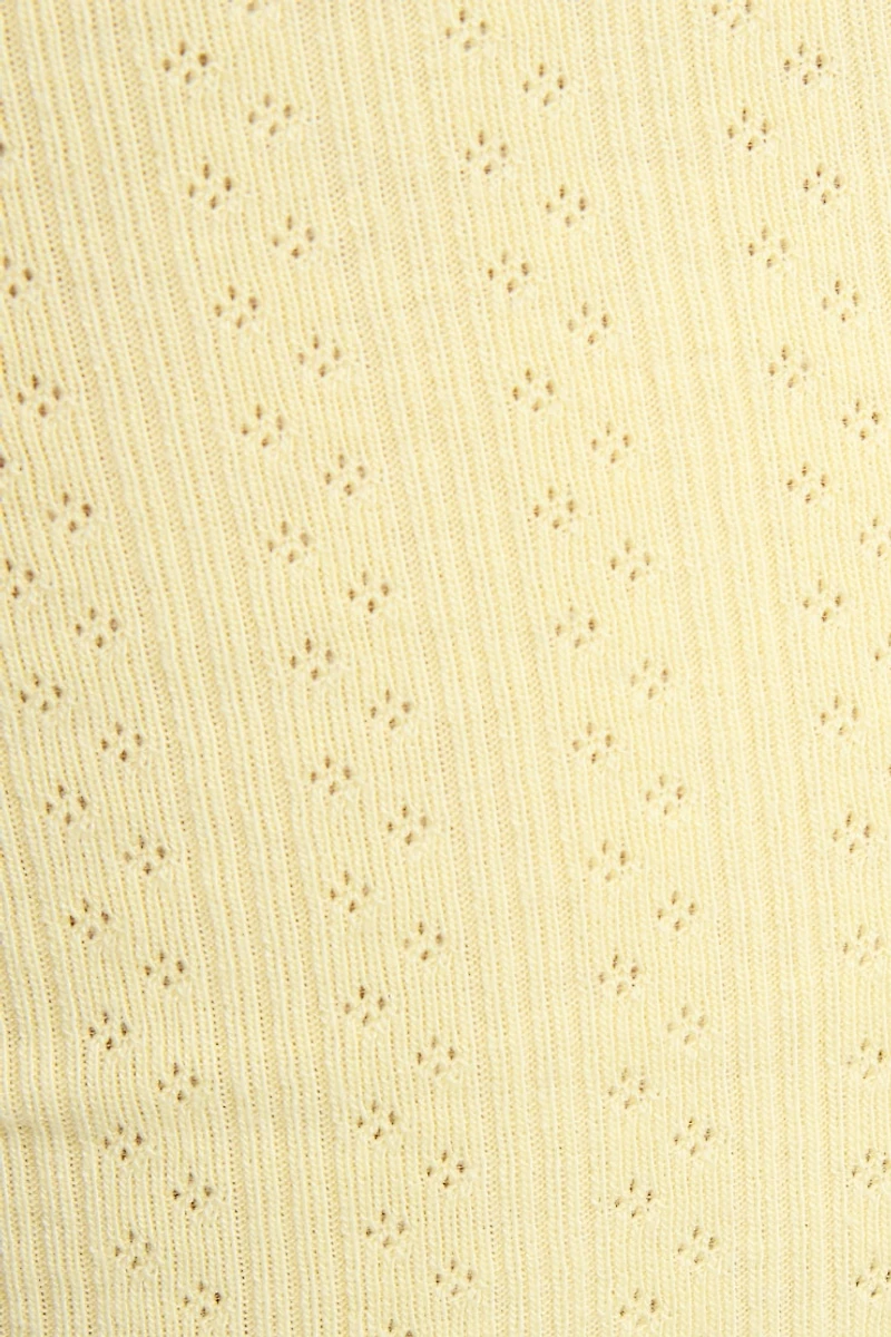 Petit short en pointelle à bordure ondulée