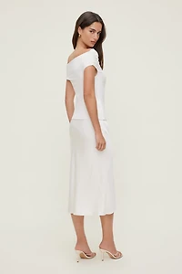 Haut sculptant orné d'une boucle