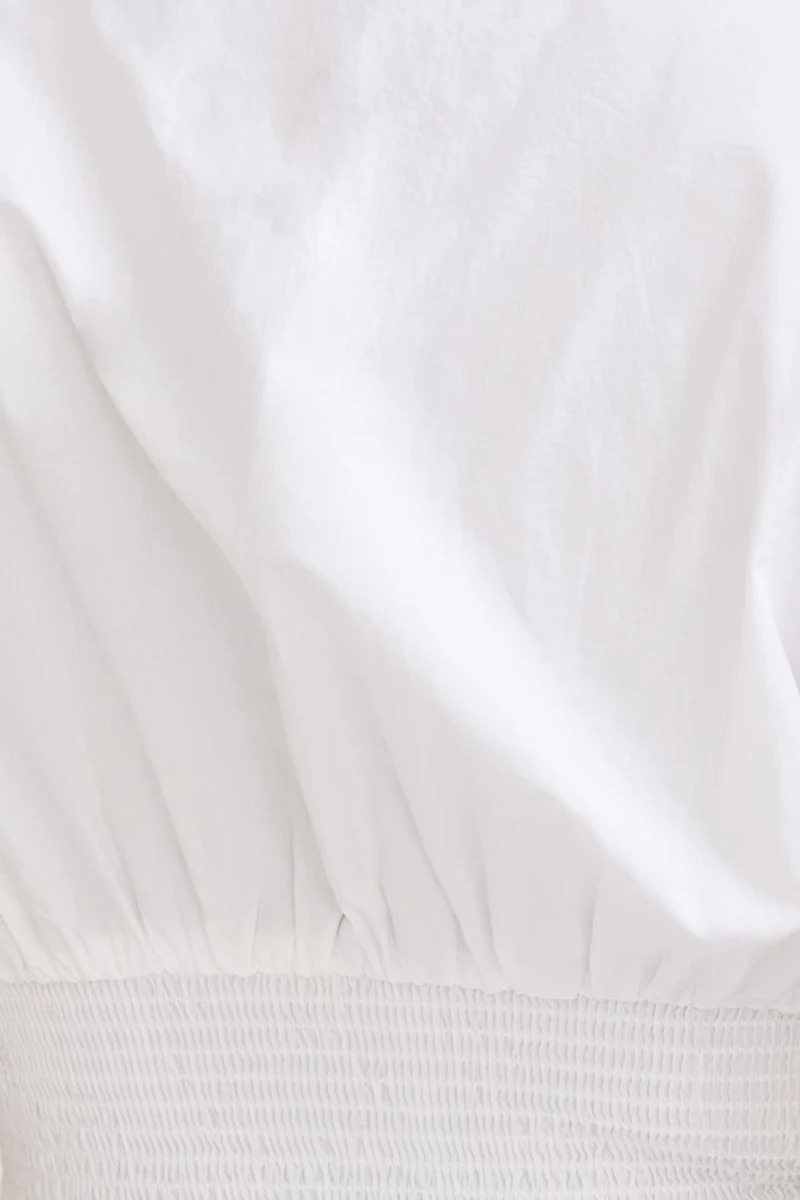 Blouse en popeline à taille smockée