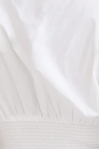 Blouse en popeline à taille smockée