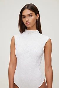 Justaucorps en dentelle à col montant