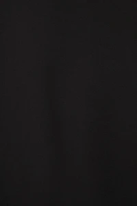 Haut semi-diaphane ouvert à volants