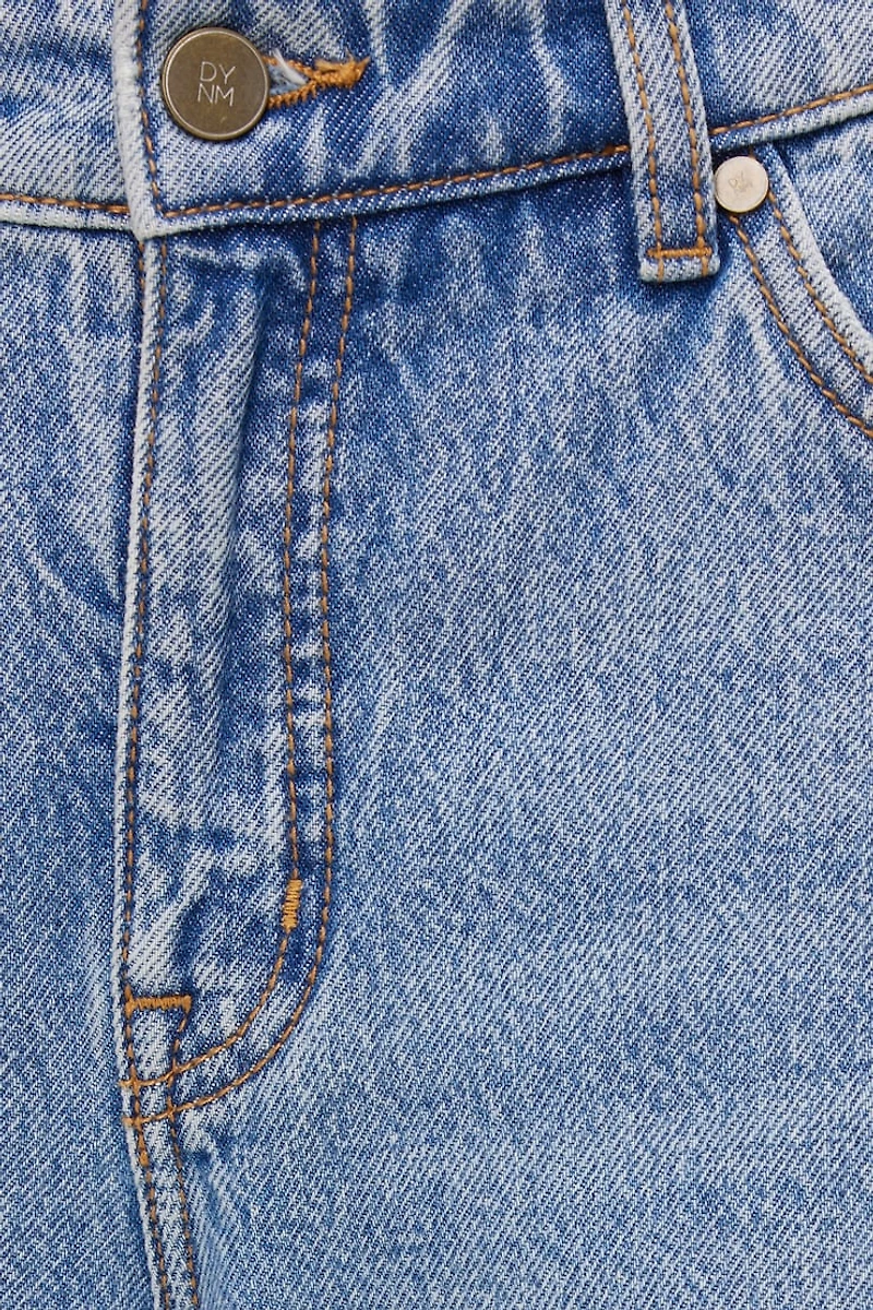 Jean Mika à taille mi-haute et jambe droite décontractée