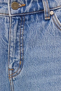 Jean Mika à taille mi-haute et jambe droite décontractée