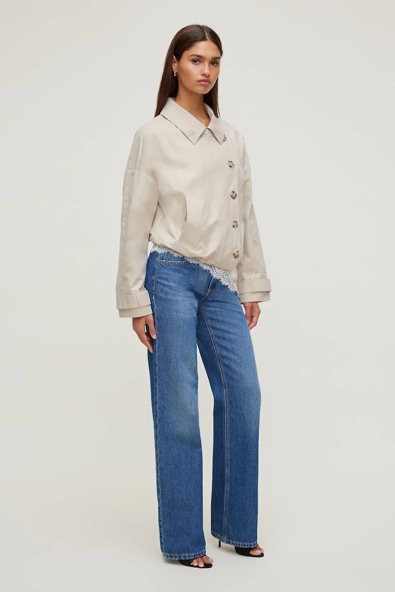 Manteau asymétrique en twill à boutons