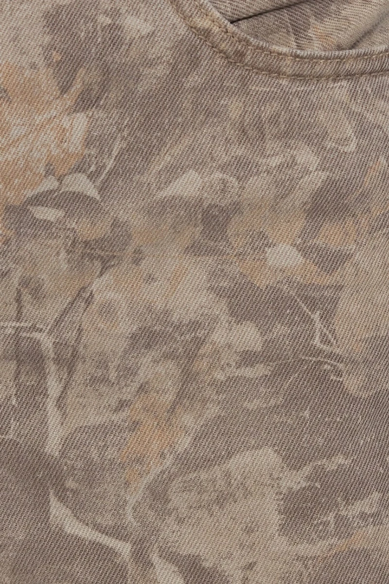 Pantalon camouflage ample à taille basse