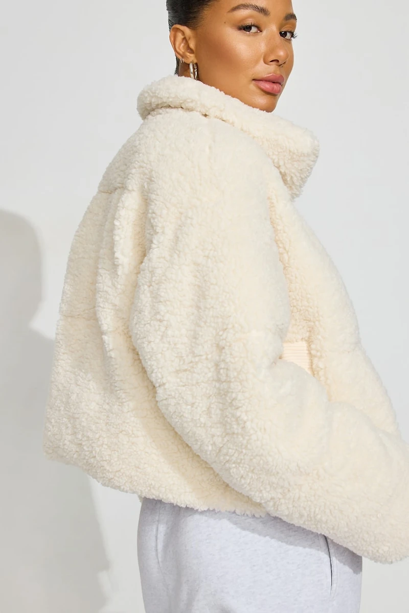Manteau matelassé en sherpa