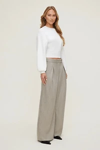 Pantalon plissé à chevrons et jambe large