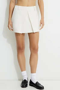 Jupe-short à pli l’avant