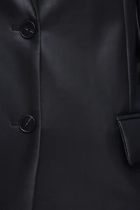 Veston ample en faux cuir