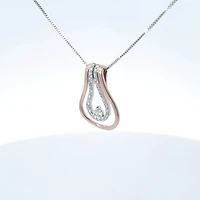 10K Two Tone Rose and White Gold 0.20cttw Diamond Pendant, 18"